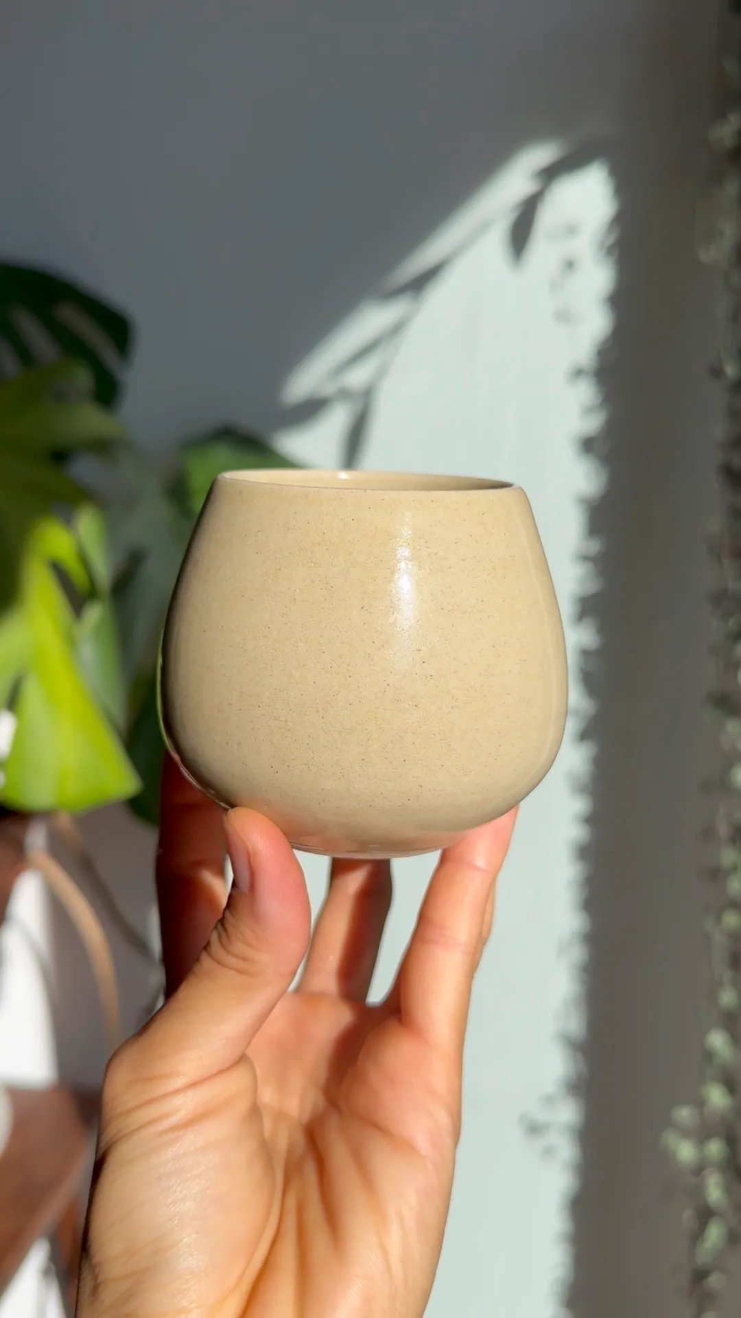 Rounded cups, sandy beige on speckled clay, view 1