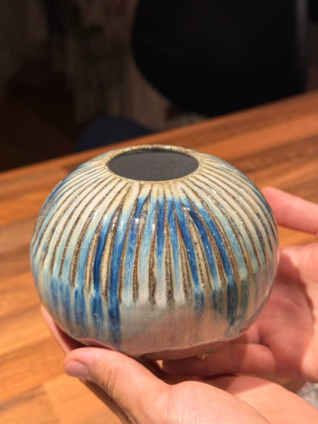 Spherical vase, hand-carved, cream with streaks of blue, view 1