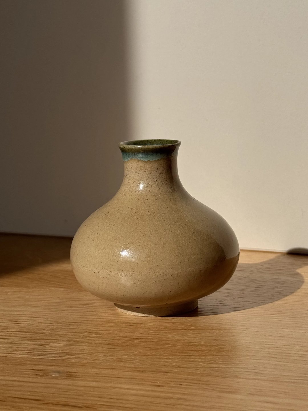 Bud vase, lightly speckled, sandy beige with viridian lip, view 1