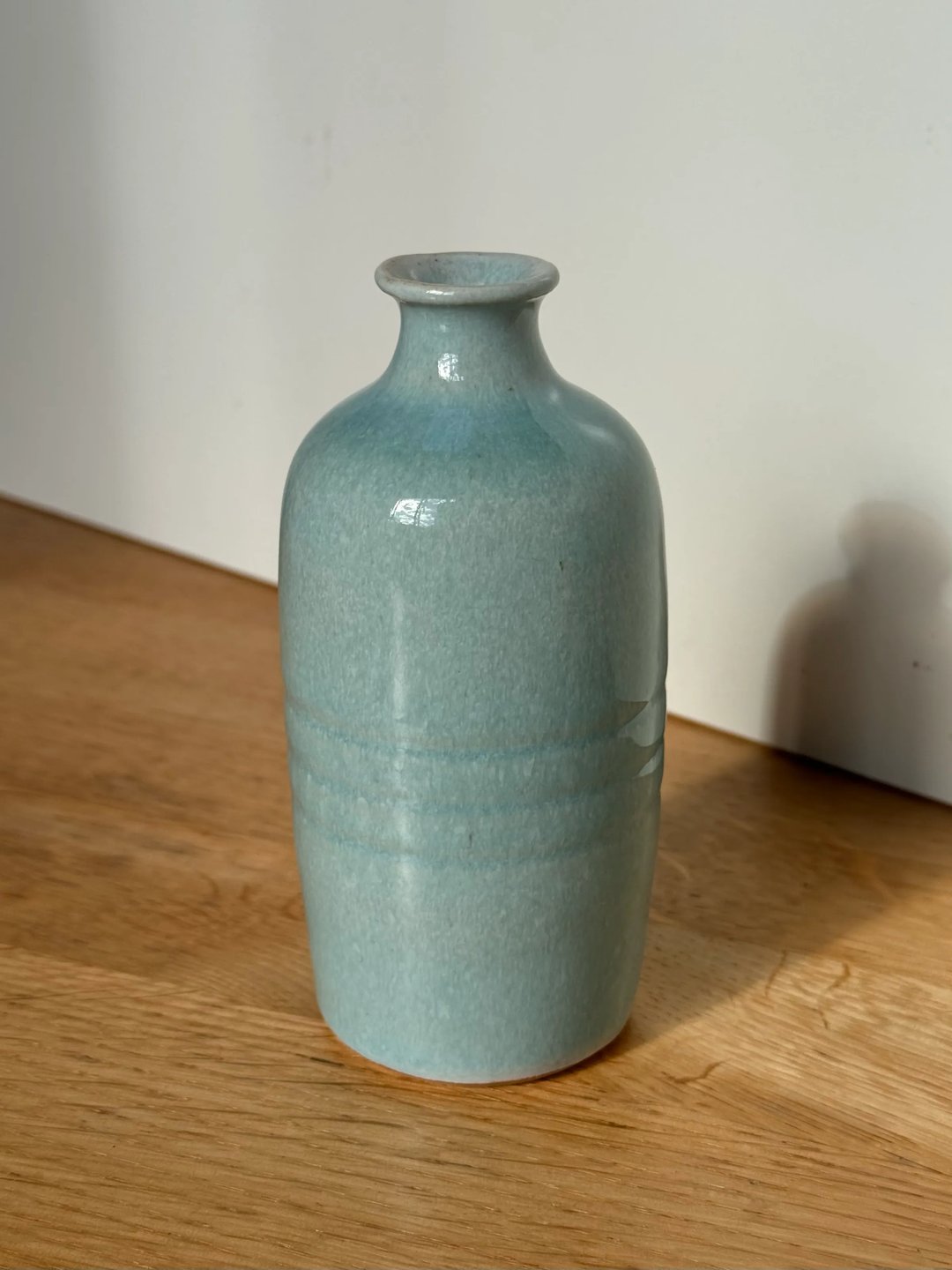 Bottle vase with a flared lip and faint ridges, pale turquoise, view 1